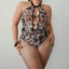 Picture of Wild Elegance: Leopard Print Teddy with Fishnet Tights